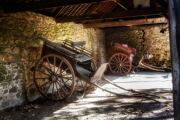 Old Barn and Horse Carriages